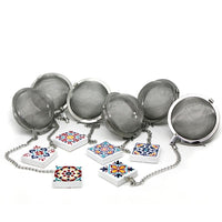 Bola de té con dije