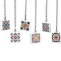 Bola de té con dije