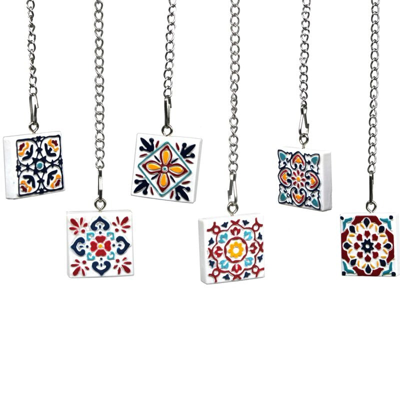 Bola de té con dije