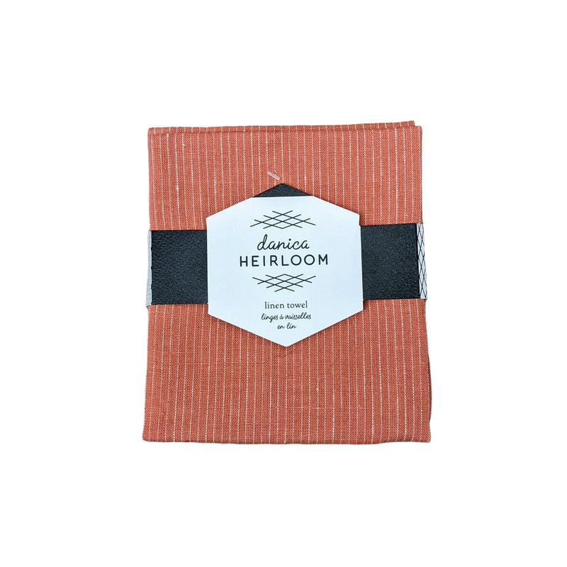 Clay linen towel with 'danica Heirloom' label 